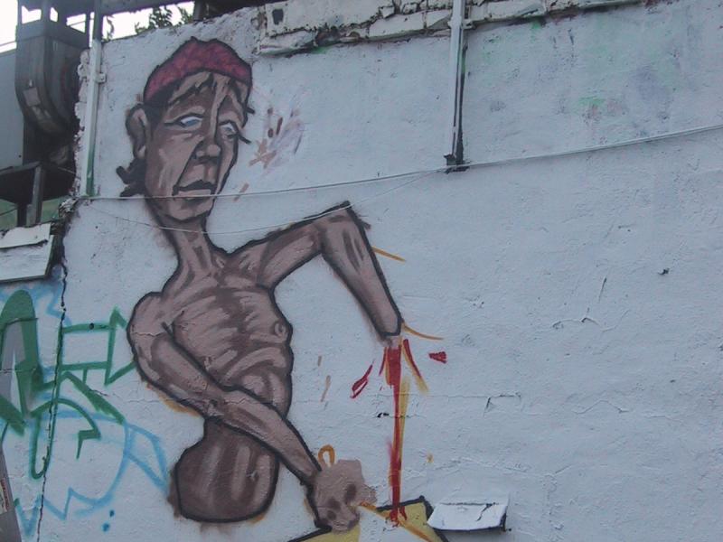 416 Grafitti Expo, Канада: мурал с обезглавленным персонажем и кровавым столом