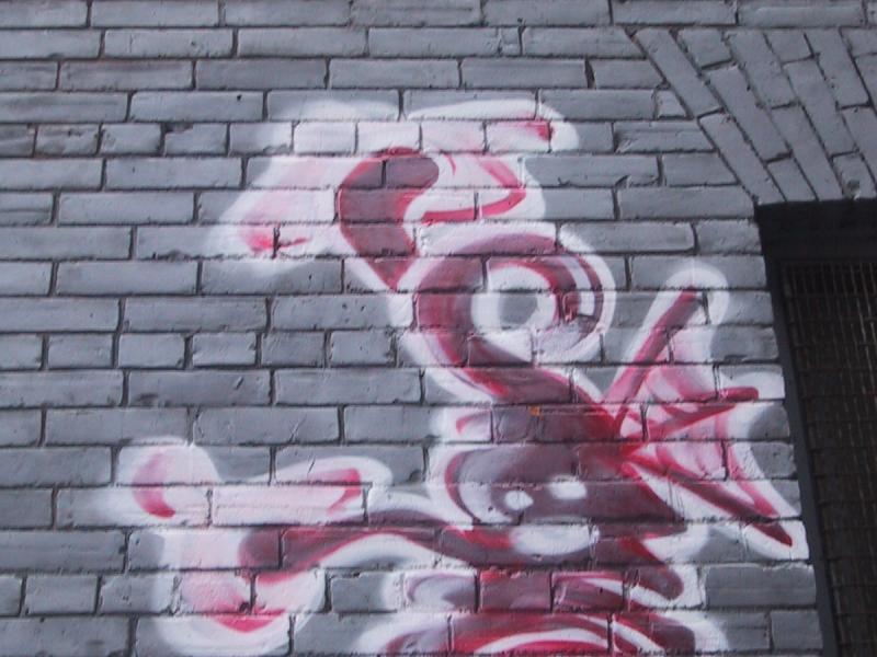 416 Grafitti Expo, Канада: красно-белый бриллиант на серой кирпичной стене