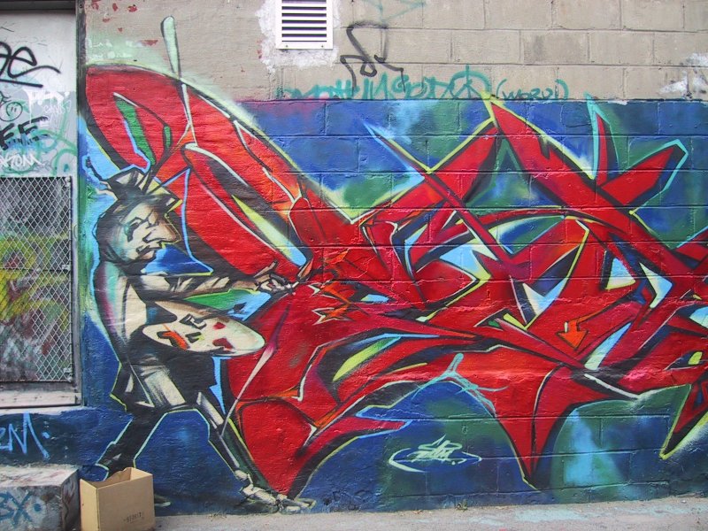 416 Graffiti Expo, Канада: красный граffiti-художник с кистью и палитрой