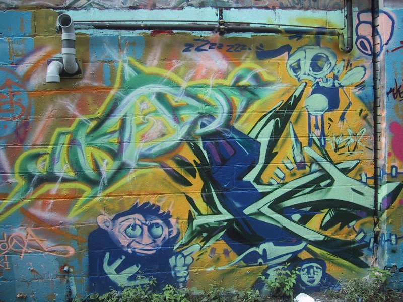416 Grafitti Expo, Канада: стена с монстрами и «zzz» над зелёным брызгом