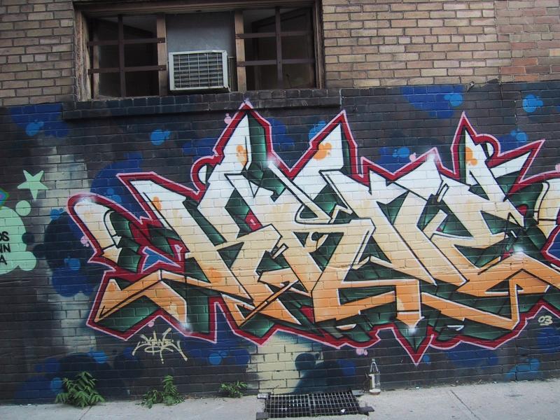 416 Grafitti Expo, Канада: бетонная стена с многоцветным граffiti и кондиционером