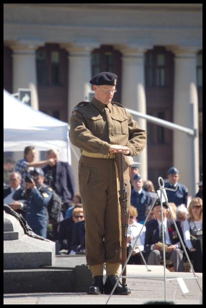 Dieppe Anniversary ceremony in Canada: soldier in 1942 Canadian Army uniform stands at attention