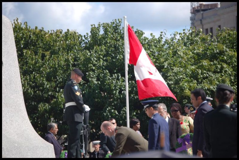 Dieppe Anniversary ceremony in Canada, 2000s: Canadian flag at half-mast near memorial