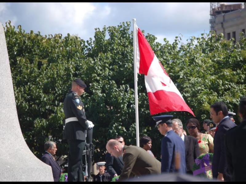 Dieppe Anniversary ceremony in Canada, 2000s: Canadian flag at half-mast near memorial