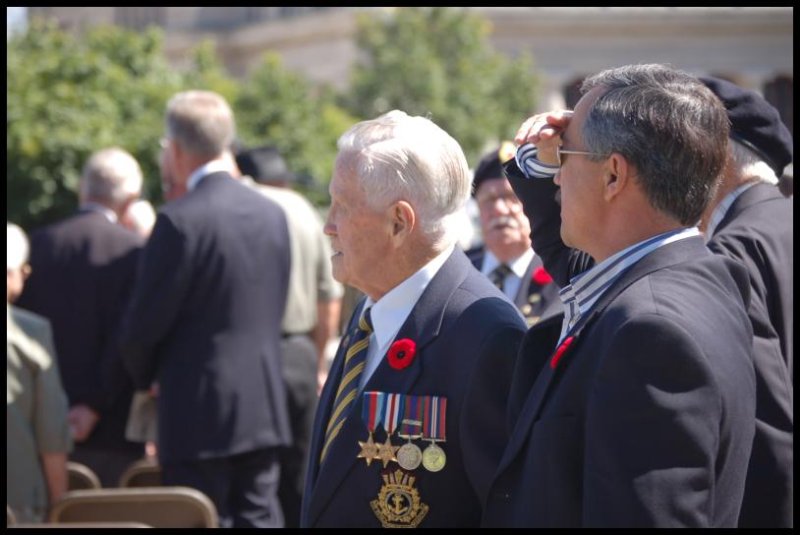 Dieppe Anniversary in Canada: veterans with medals and poppies