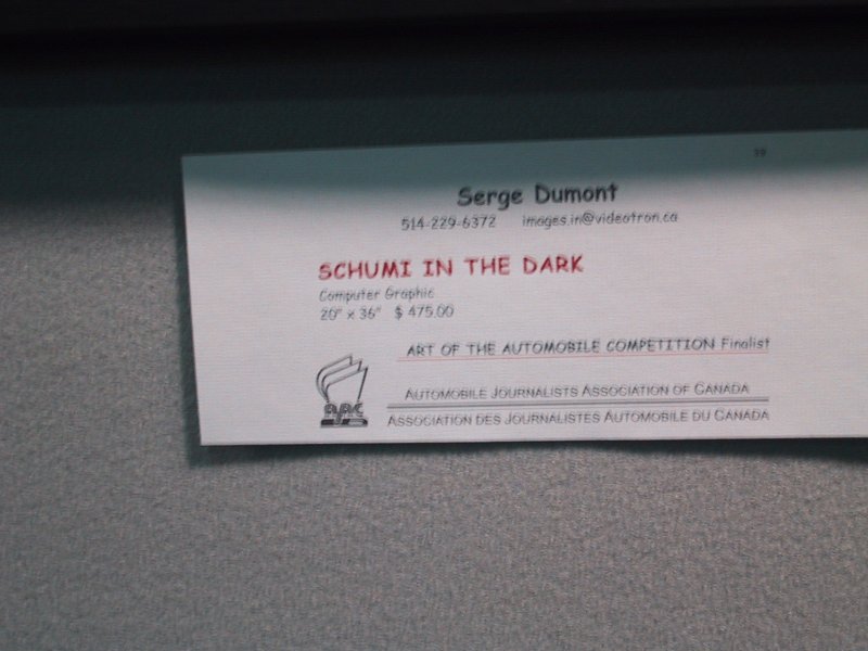 Toronto Autoshow 2004: табличка с работой Serge Dumont «Schumi in the Dark»