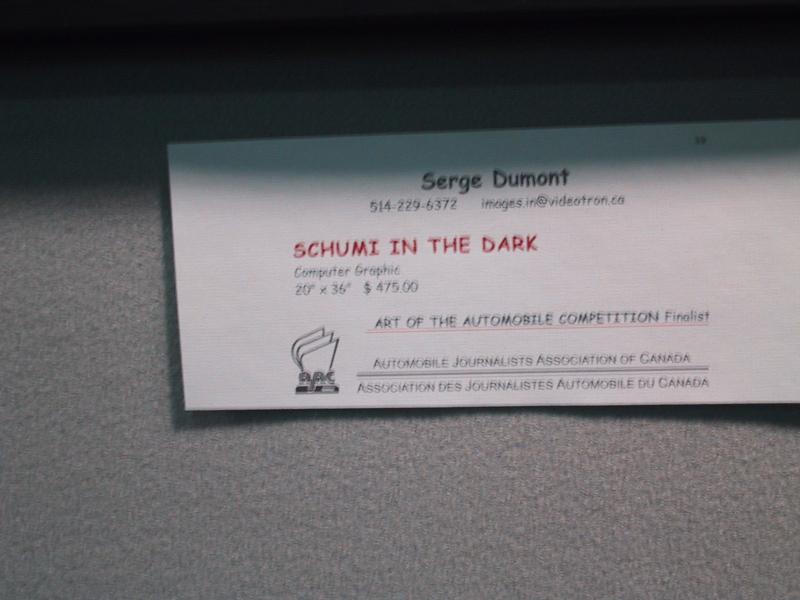 Toronto Autoshow 2004: табличка с работой Serge Dumont «Schumi in the Dark»