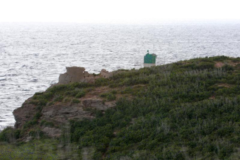 Кап-Корс, Корсика, 2008: зелёный фонарь на скалистом мысе