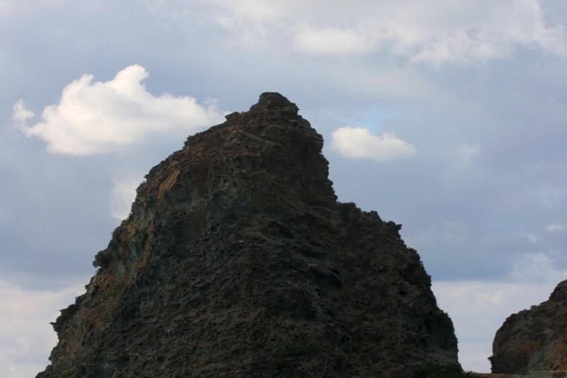 Кап-Корс, Корсика, 2008: островерхий вулканический пик над морем