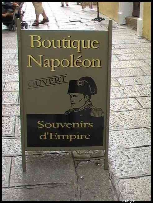 Ajaccio, 2008: вывеска «Boutique Napoléon» на каменной улице