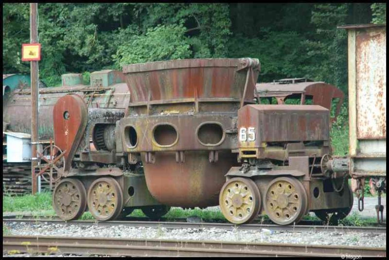 Train, Люксембург, 1900: ржавый вагон с номером 65 на путях