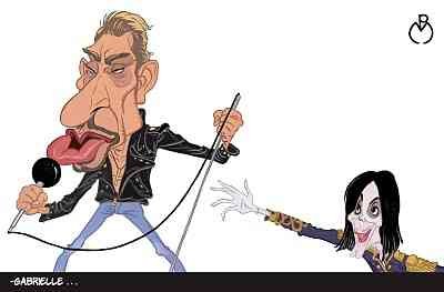 Mate, 2023: карикатура на сцене с микрофоном и вытянутой рукой