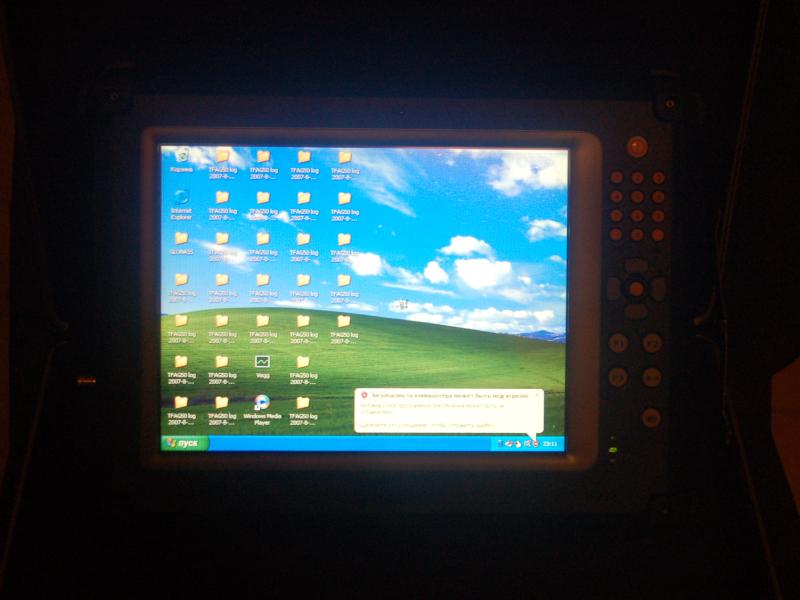 ORSiO TP701 с рабочим столом Windows XP на экране