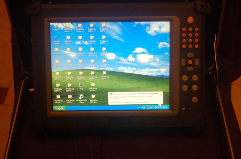 ORSiO TP701 с экраном Windows XP и уведомлением о безопасности
