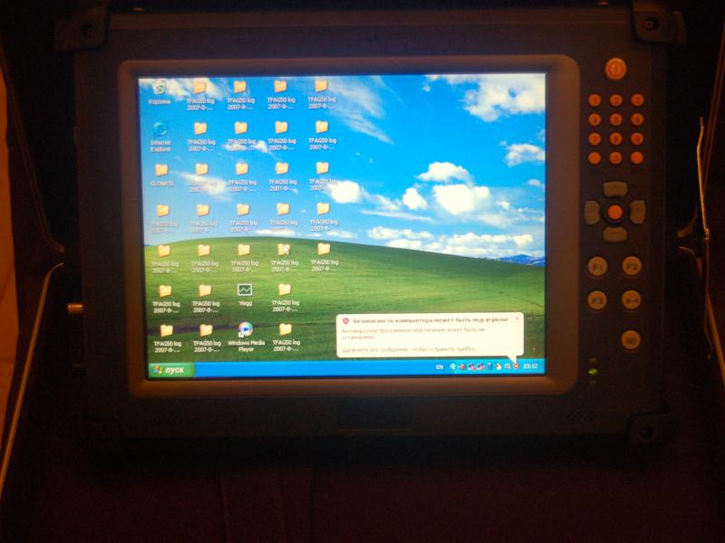 ORSiO TP701 с экраном Windows XP и уведомлением о безопасности
