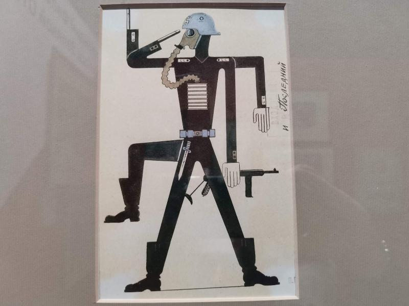 Kino Museum: агитационный плакат с солдатом в шлеме и противогазе